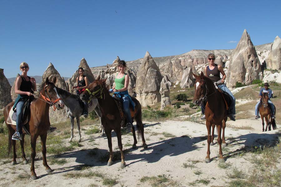 Horseriding girls in Cappadocia